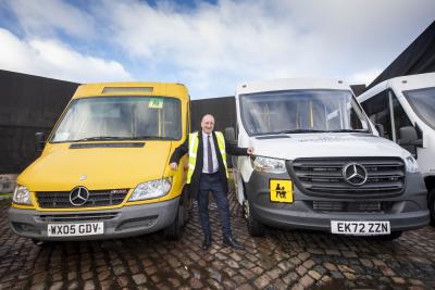 With one of the new minibuses which will replace the older yellow vehicles is Councillor Steve Evans, cabinet member for city environment and climate change