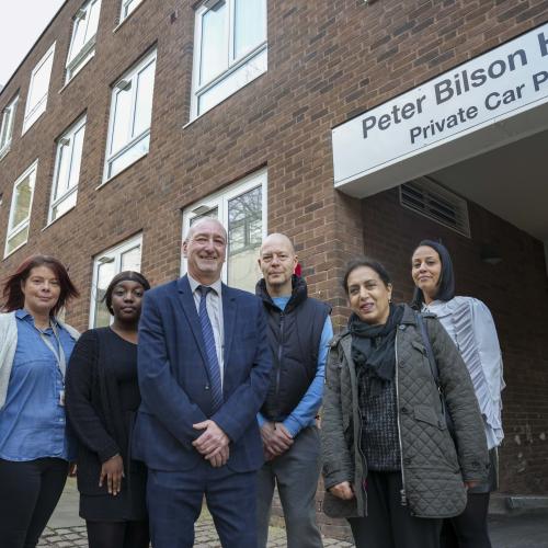 (L-R): P3 Support Workers Tara Smith and Tajah Wright, Councillor Steve Evans, Deputy Leader and Cabinet Member for Housing at City of Wolverhampton Council, Peter Bilson House resident Leeroy Haynes, Councillor Jasbir Jaspal, Cabinet Member for Adults and Wellbeing at City of Wolverhampton Council and Peter Bilson House Manager at P3 Stephanie Holland, outside Peter Bilson House